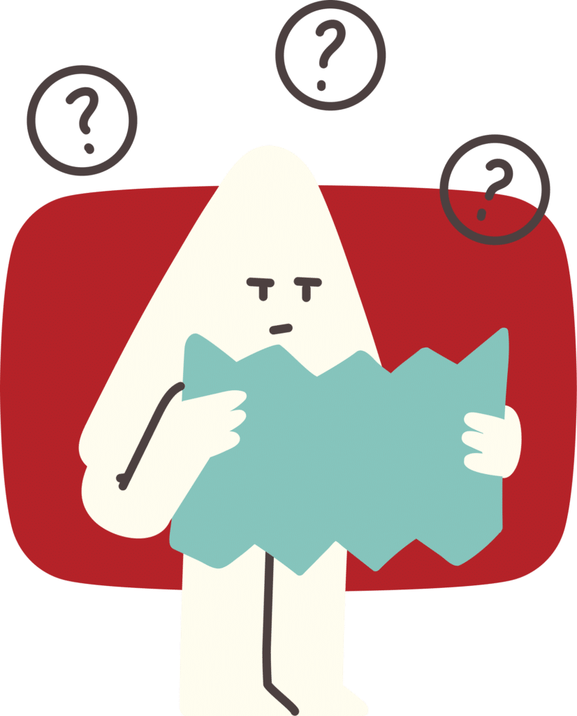 Selitysvideo maskotti lukee usein kysyttyjä kysymyksiä lehtiöstä